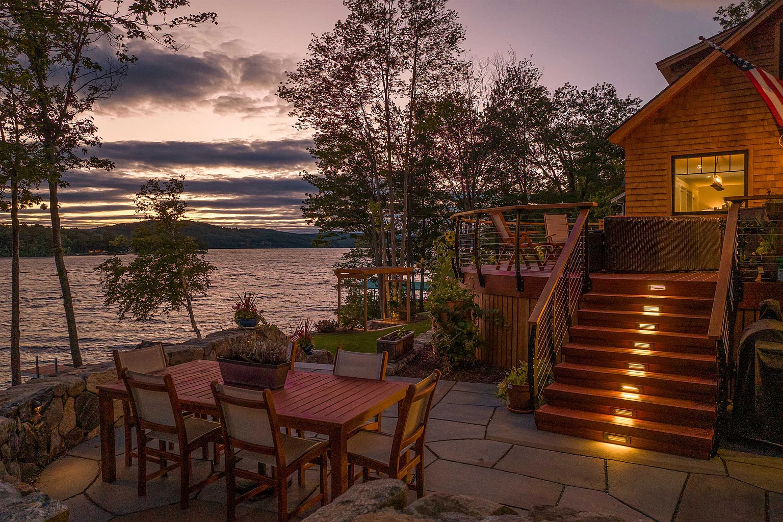 Lakefront home with deck step lighting installed by Atlantic Electrical Services in York County Maine